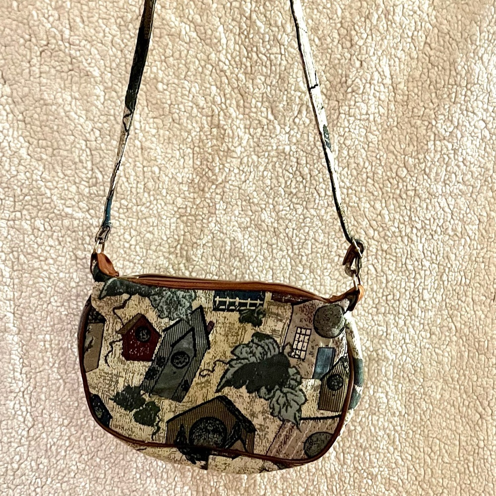 Birdhouses on white tapestry styled purse approximately 15inches across